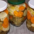 A simple recipe for cooking cucumbers with carrots and onions for the winter