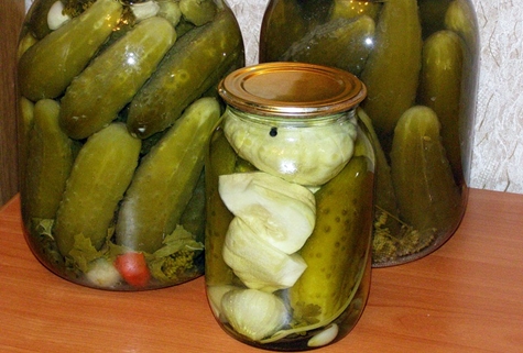 pickled cucumbers with celery in a liter jar