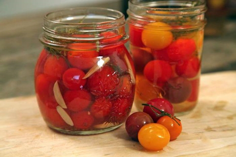 lightly salted cherry tomatoes in jars