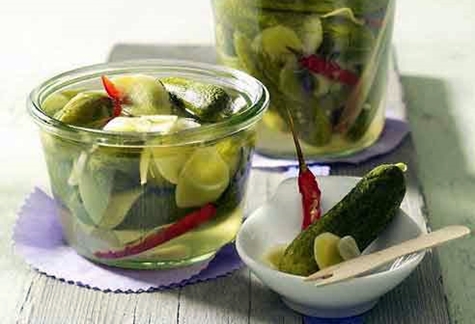 cucumbers in apple juice in a bowl