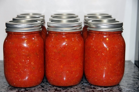 adjika zamaniha in a jar on the table