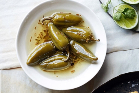 marinated jalapeno peppers in a plate