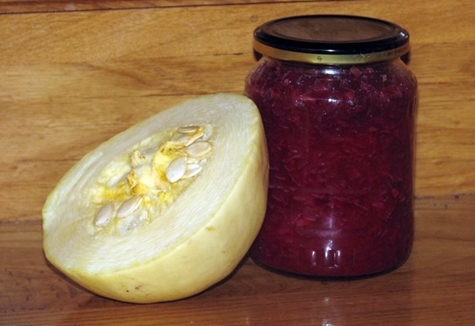 zucchini with beets in a jar on the table