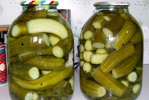 cucumbers in apple juice in jars