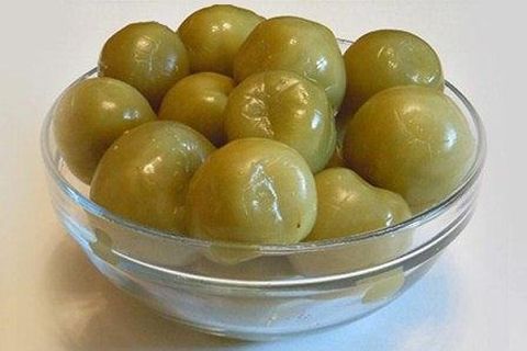 pickled tomatoes in a plate