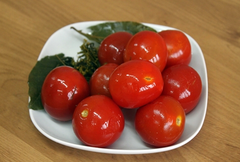 pickled tomatoes in a plate