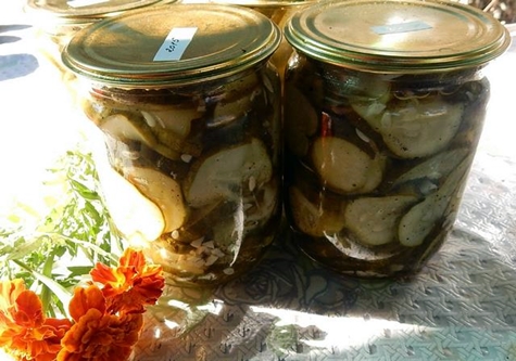 spicy Kremlin cucumbers on the table in jars