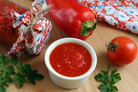 adjika with horseradish in a jar