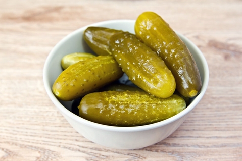 cucumbers with honey in a bowl