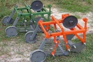 How to make a potato digger for a walk-behind tractor with your own hands?