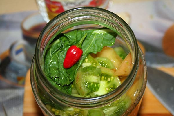 green tomatoes in a jar