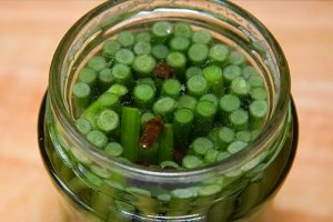 arrows of garlic in a jar