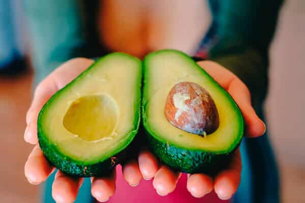 avocado in hand