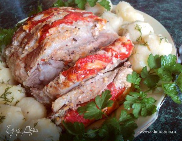 Cerdo al horno con tomates