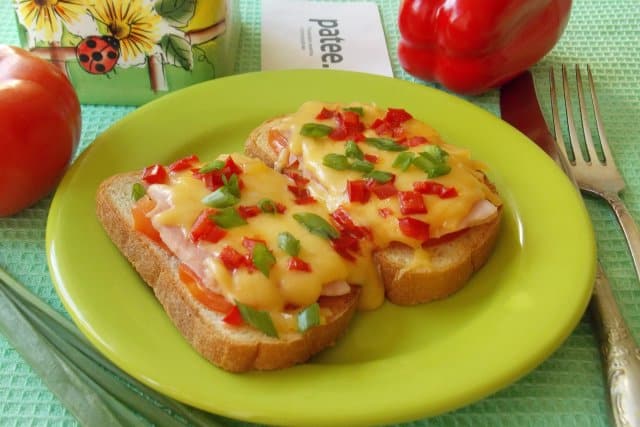 With cheese and tomatoes