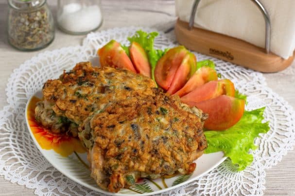 Chuletas de cerdo rebozadas con champiñones