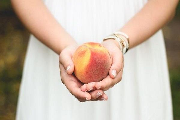 fruit in hand