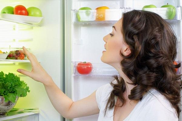 the girl by the refrigerator