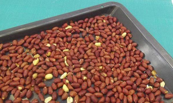 peanuts on a baking sheet