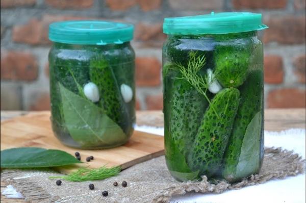 cucumbers with a candle for the winter