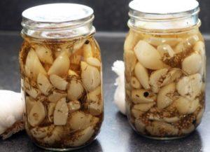 A step-by-step recipe for cooking garlic for the winter in oil