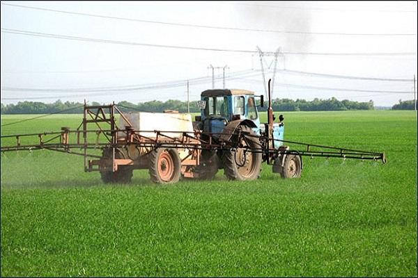 application d'herbicide