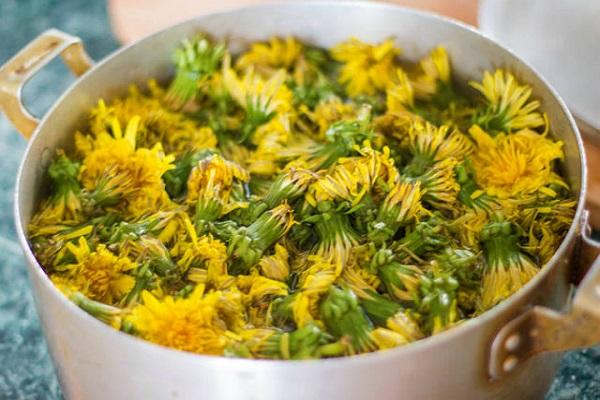 a saucepan of flowers