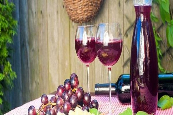 vino con uvas